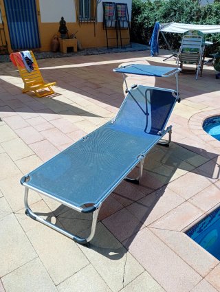 Tumbona plegable con parasol