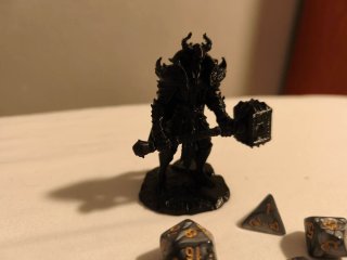 Bolsa de rol, dados y figura heroe