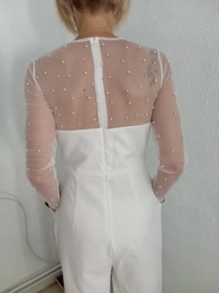 Mono elegante blanco de vestir