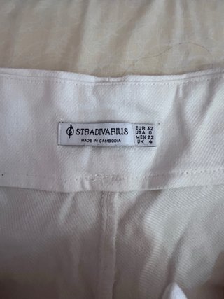 Pantalón de pinzas tiro alto Stradivarius