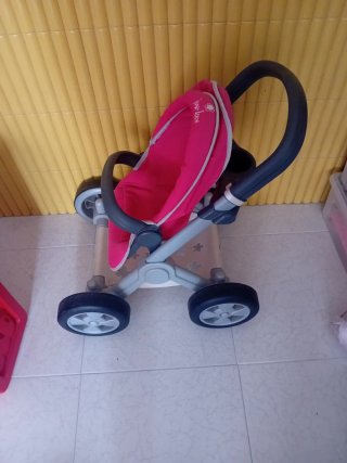 Cochecito de bebé de juguete rosa