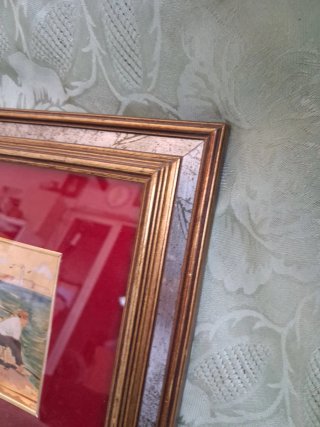 Quadro vintage con cornice dorata