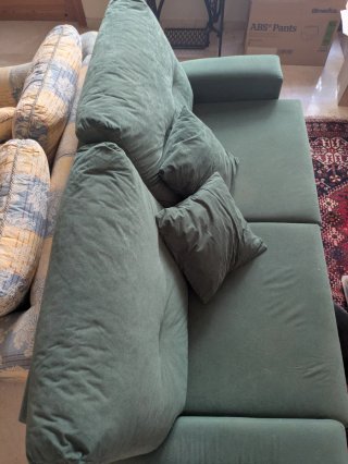 Sofá cama verde de tela
