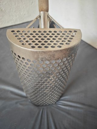 Pala Sand Scoop para reparar