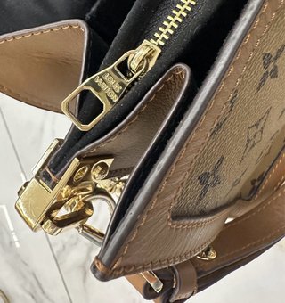 Bolso Louis Vuitton Marrón y Dorado