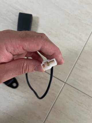 Cinturón seguridad retractor pretensor