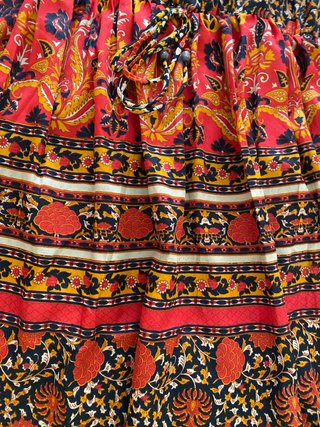 Abito lungo boho chic arancione e nero