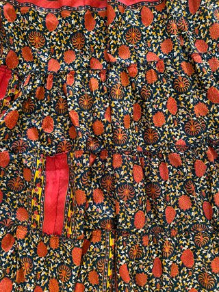 Abito lungo boho chic arancione e nero