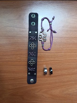 Pulsera cuero, pulsera puzzle y anillos plata/negr