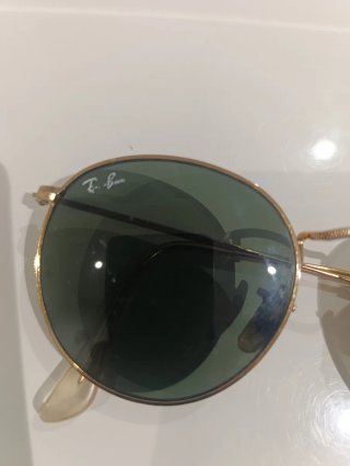 Gafas de sol Ray-Ban doradas redondas