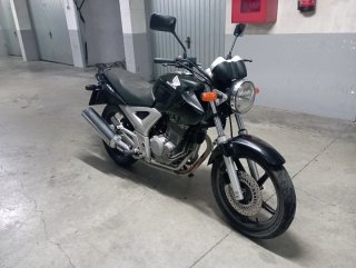 Honda 250cc Negra y Plateada
