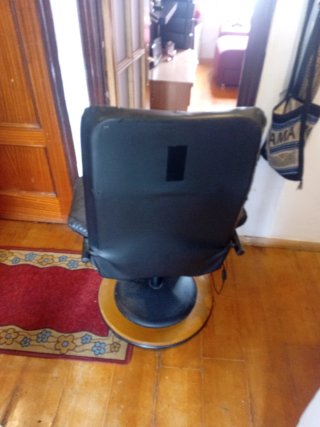 Silla vibratoria de pies a cabeza en buen estado.