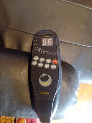 Silla vibratoria de pies a cabeza en buen estado.