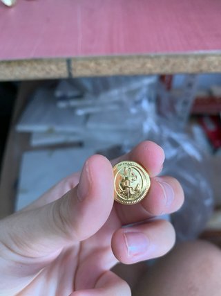 Botones dorados con ancla grandes y pequeños