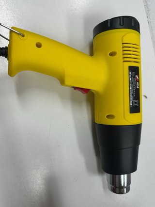 Pistola de aire caliente amarilla