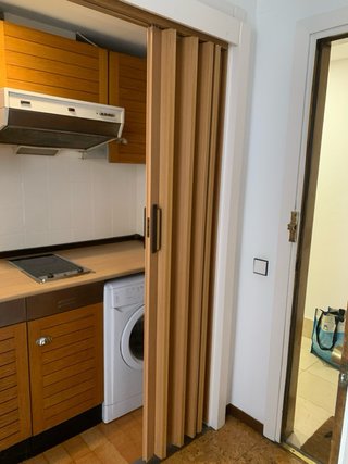 Puerta corredera plegable de fuelle