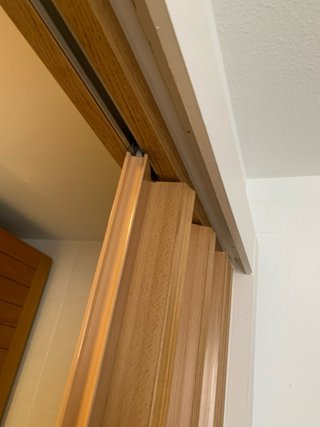 Puerta corredera plegable de fuelle