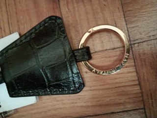 Borsa Moschino nera con logo oro