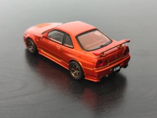 Nissan Skyline GT R34 Naranja 1/64