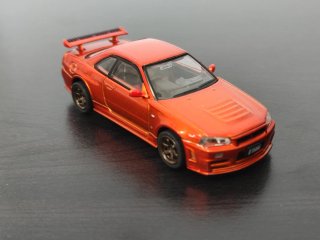 Nissan Skyline GT R34 Naranja 1/64