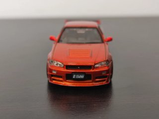 Nissan Skyline GT R34 Naranja 1/64