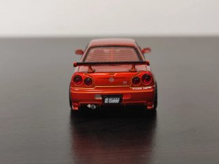 Nissan Skyline GT R34 Naranja 1/64