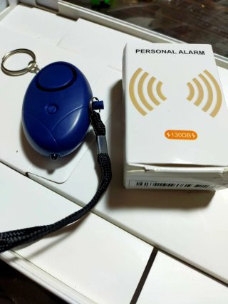 Alarma personal llavero con linterna A ESTRENAR