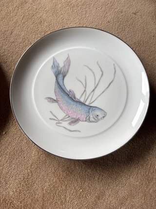 Juego de porcelana con peces
