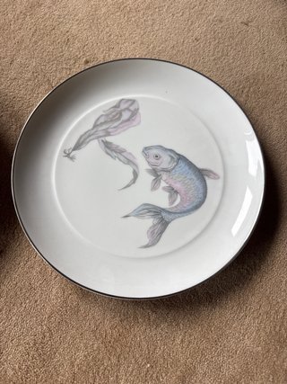Juego de porcelana con peces