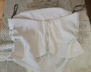 Top beige/blanco con cremallera