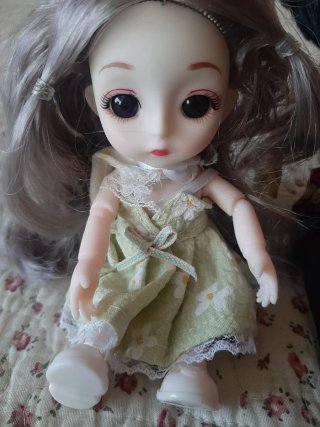 2 Muñecas, la pequeña articulada