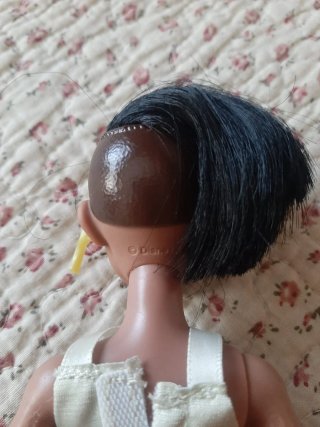 2 Muñecas, la pequeña articulada