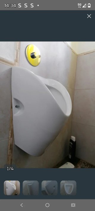 Urinario Roca Blanco y Dorado Nuevo trae griferia