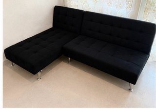 Sofá modular negro tipo chaise longue