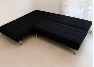 Sofá modular negro tipo chaise longue