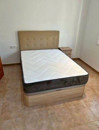 Camas y armarios