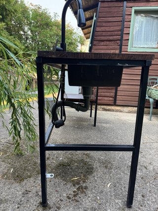 Barra mostrador con fregadero exterior