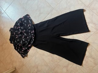Tuta jumpsuit nera con fantasia di uccellini rosa