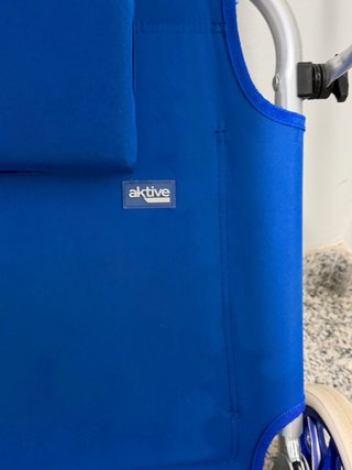 Silla de playa con ruedas y parasol