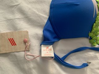 Bañador azul con detalles de nudos