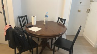 Mesa de comedor redonda de madera