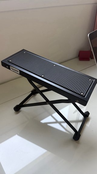 pie para guitarra