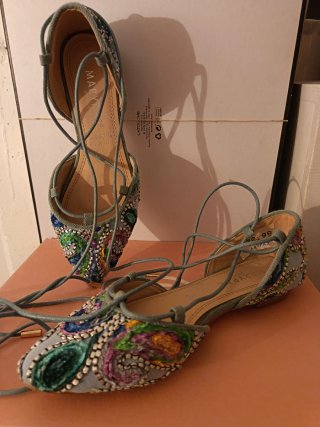 Zapatos planos bordados con cordones