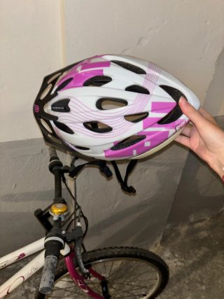 Bicicleta de mujer blanca y rosa