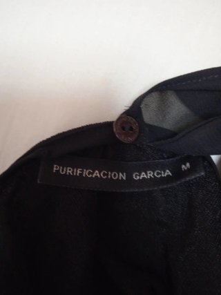 Camisa negra con pedrería