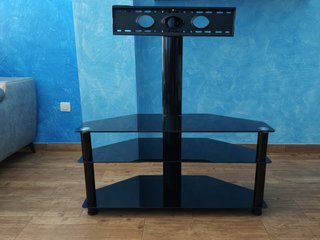 Estantería con soporte para TV negra con poco uso.