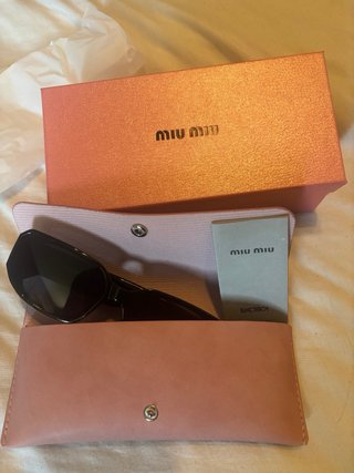Ulleres de sol Miu Miu negres + funda i caixa