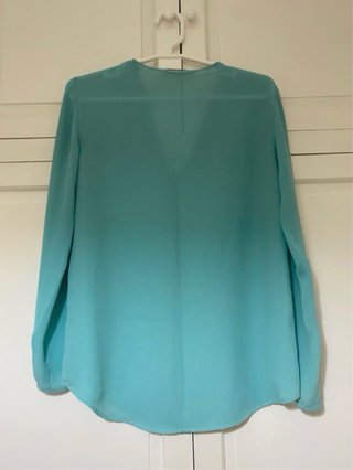 Blusa turquesa manga larga
