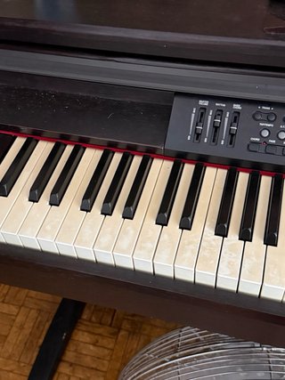 Piano digital en buen estado en perfectas condicon