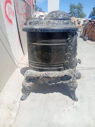 Chimenea de hierro  escucho ofertas